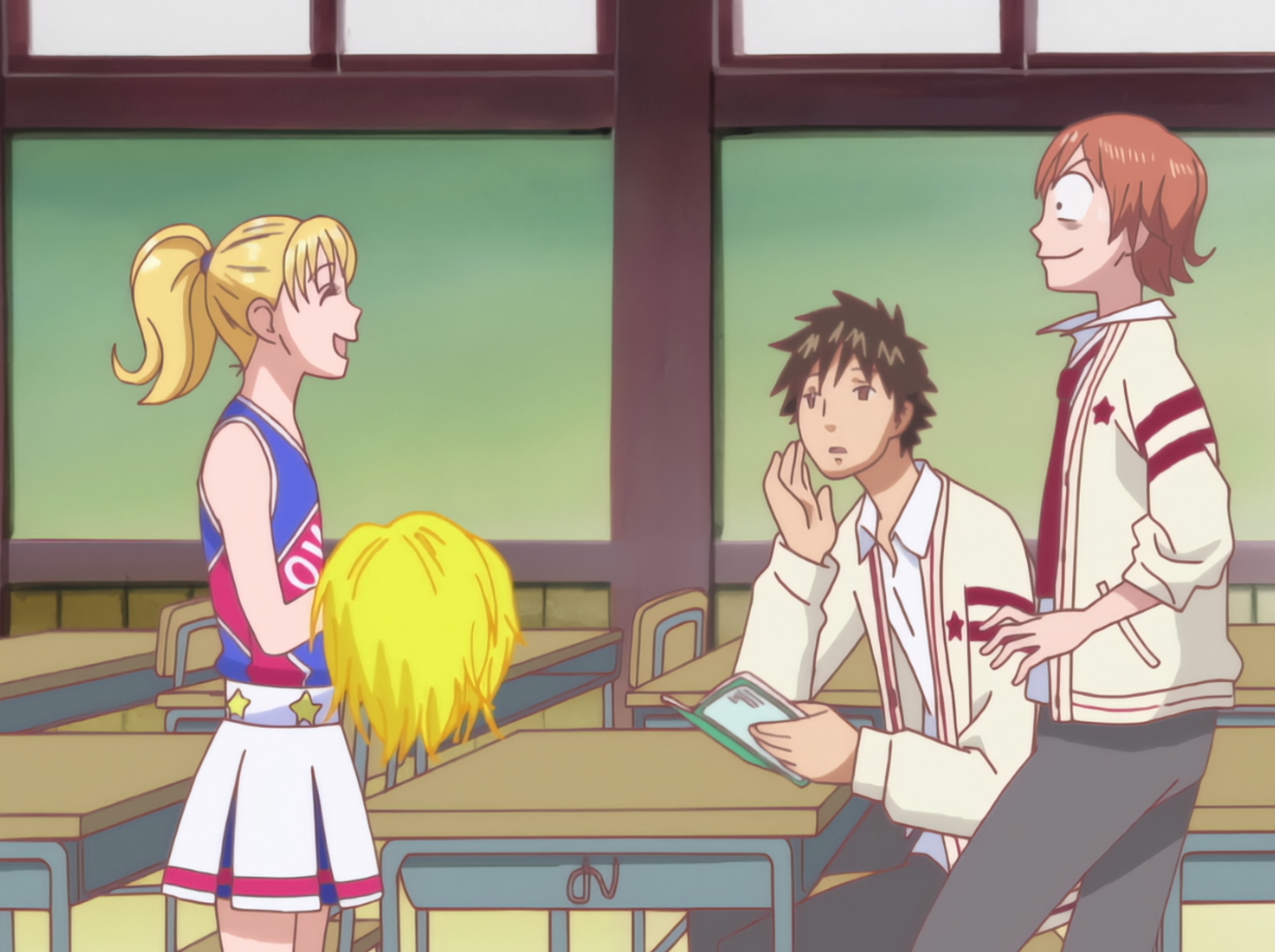 A cute petite blond girl smiles while wearing a cheerleading outfit while a boy looks over at her shocked.